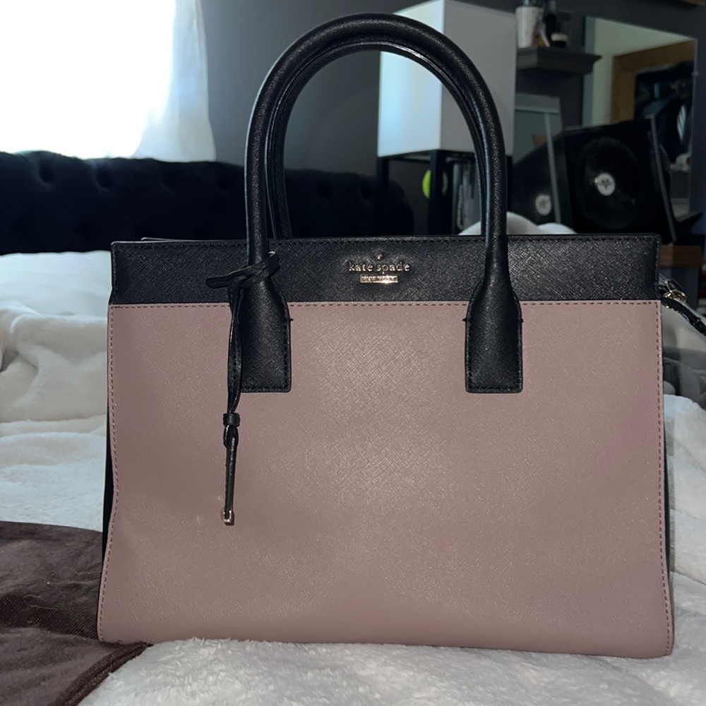 Kate Spade handbag barely used but a few times with long strap and dust bag